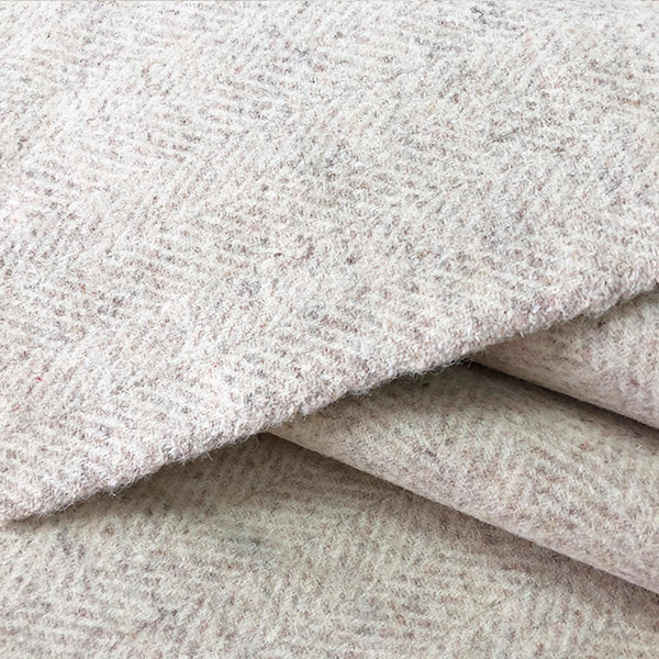 工廠供應(yīng)現(xiàn)貨秋冬女裝大衣人字呢面料