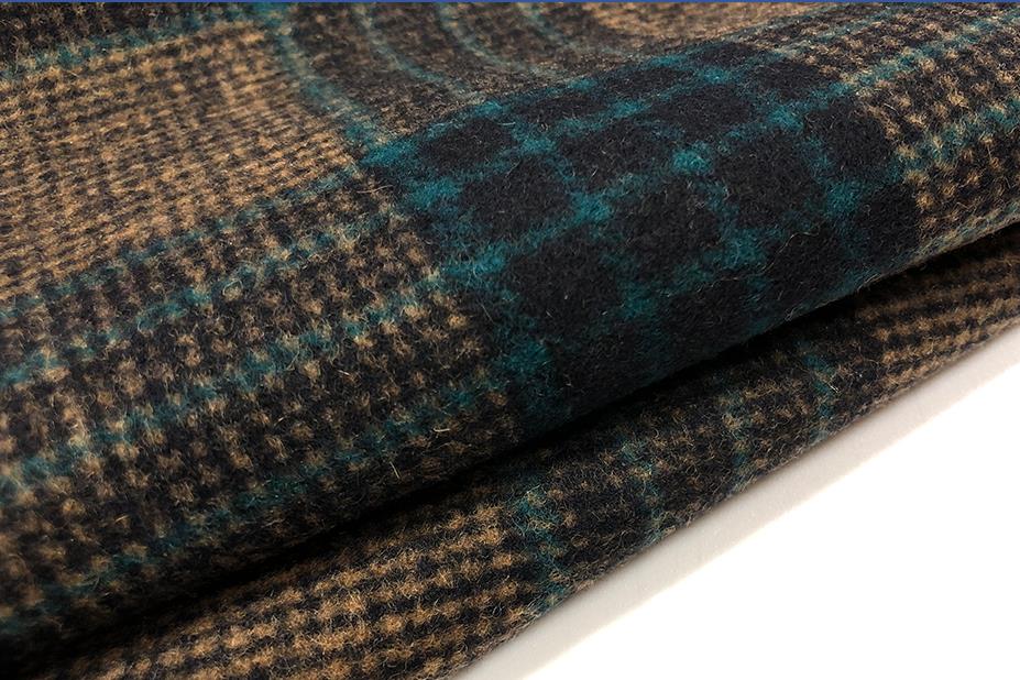 呢子布廠家70毛滌雙色格子毛呢布料